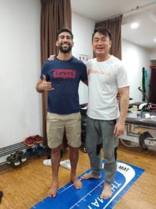 Charly BJJ Coach-Knee and wrist treatment